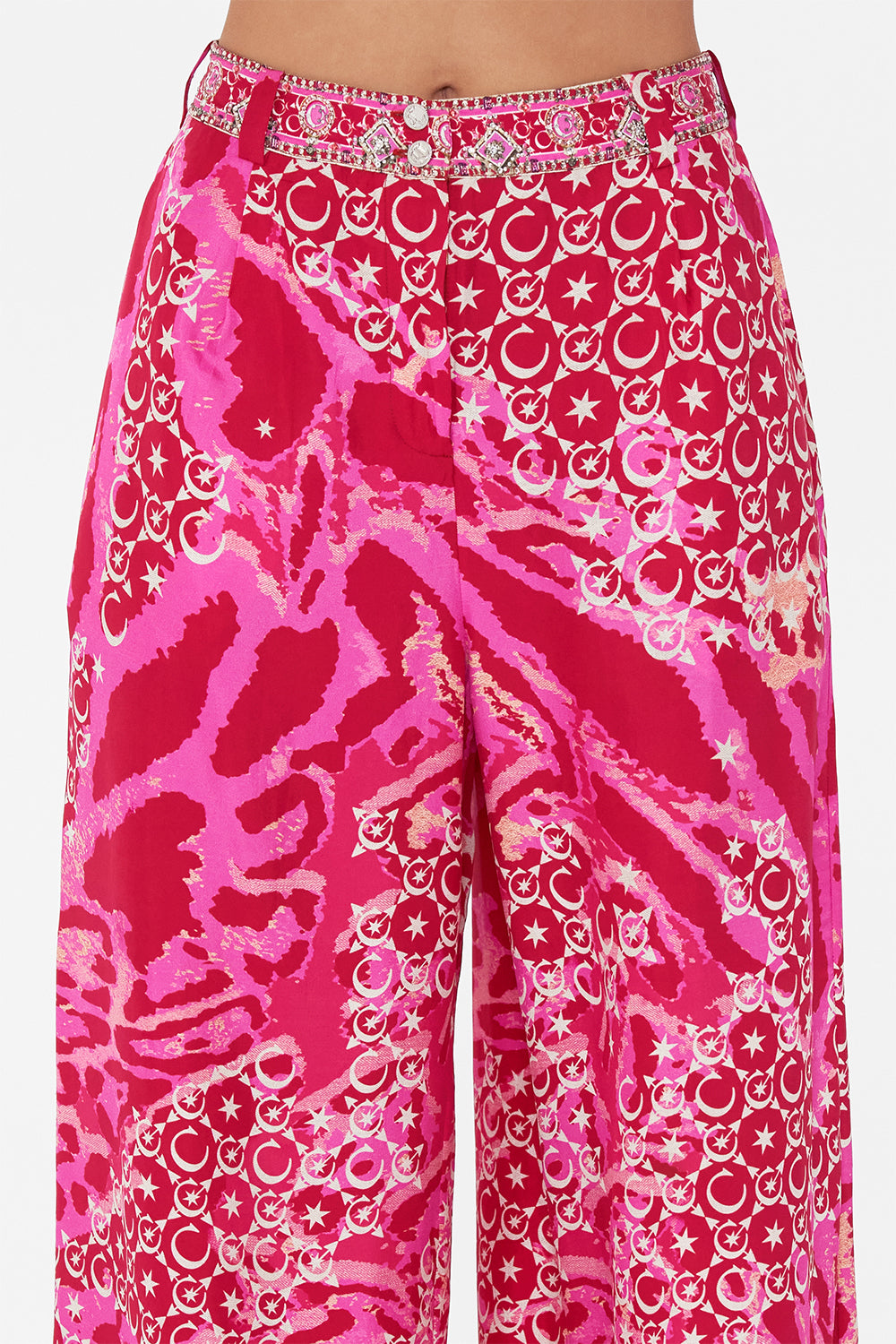 Detail view of model wearing CAMILLA silk palazzo pants in Song Of Sacrifice print