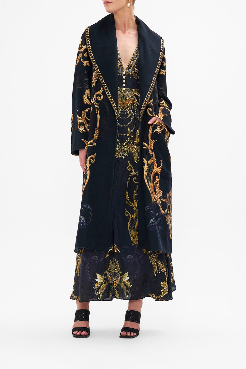 Front view of model wearing CAMILLA long wool coat in Moonlight Melodies print