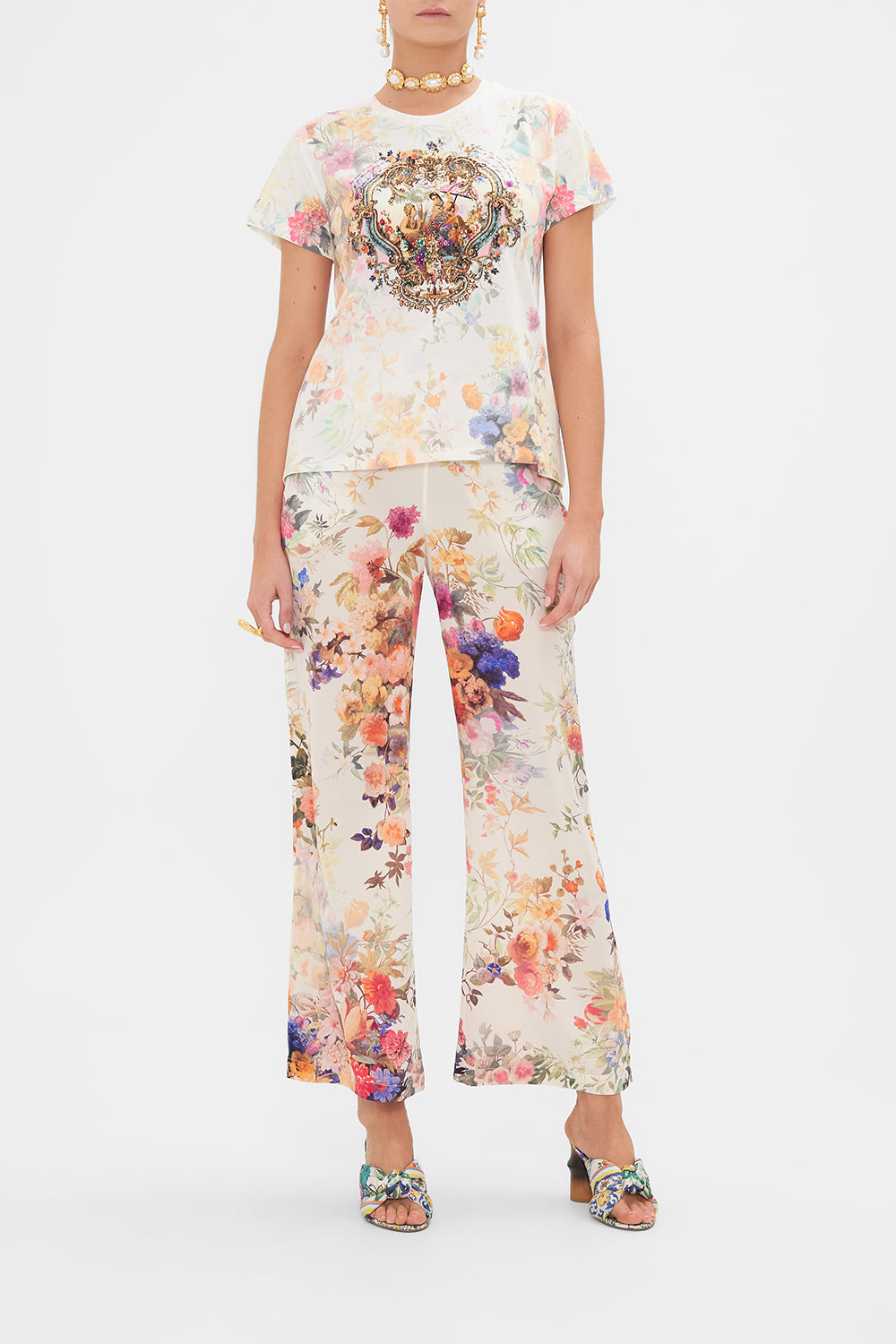 Front view of model wearing CAMILLA cotton tee with Friends with Frescos print