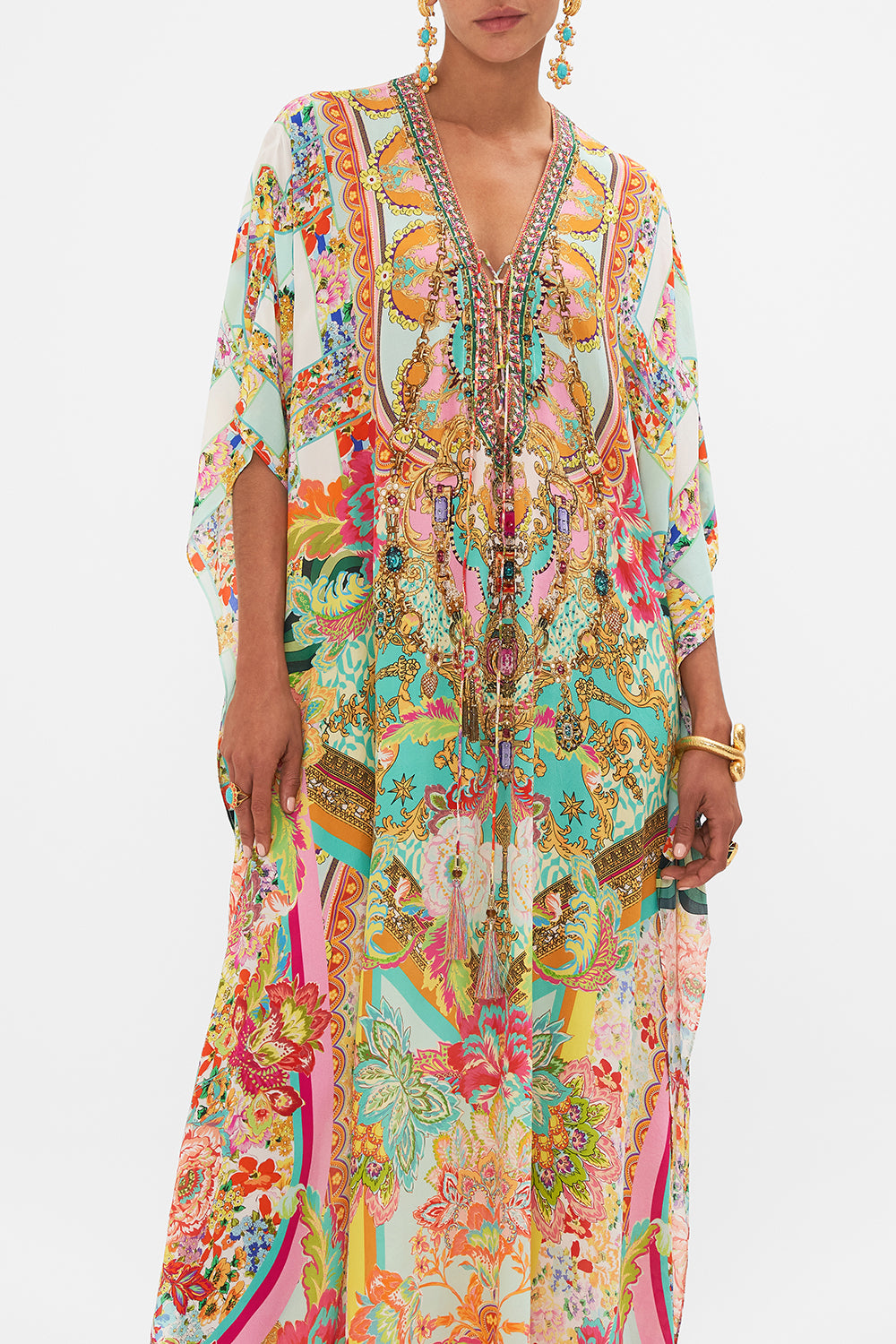 Crop view of model wearing CAMILLA silk printed kaftan in An Italian Welcome print