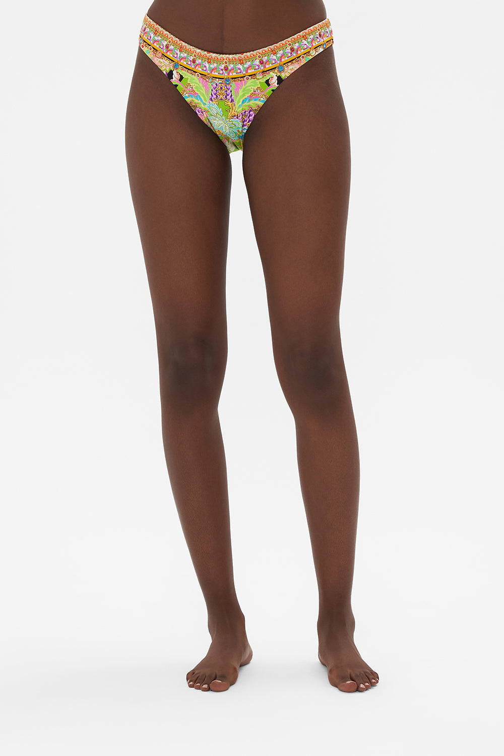 Crop view of model wearing CAMILLA swimwear printed bikini bottoms in Sundowners in Sicily print