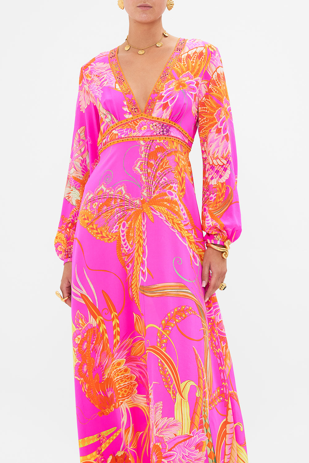 Crop view of model wearing CAMILLA pink silk dress in A Heart That Flutters print