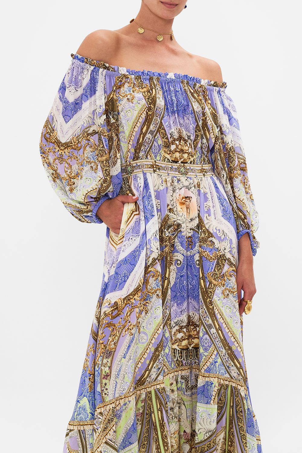 Detail view of model wearing CAMILLA frill off the shoulder dress in Guilded Pleasures print