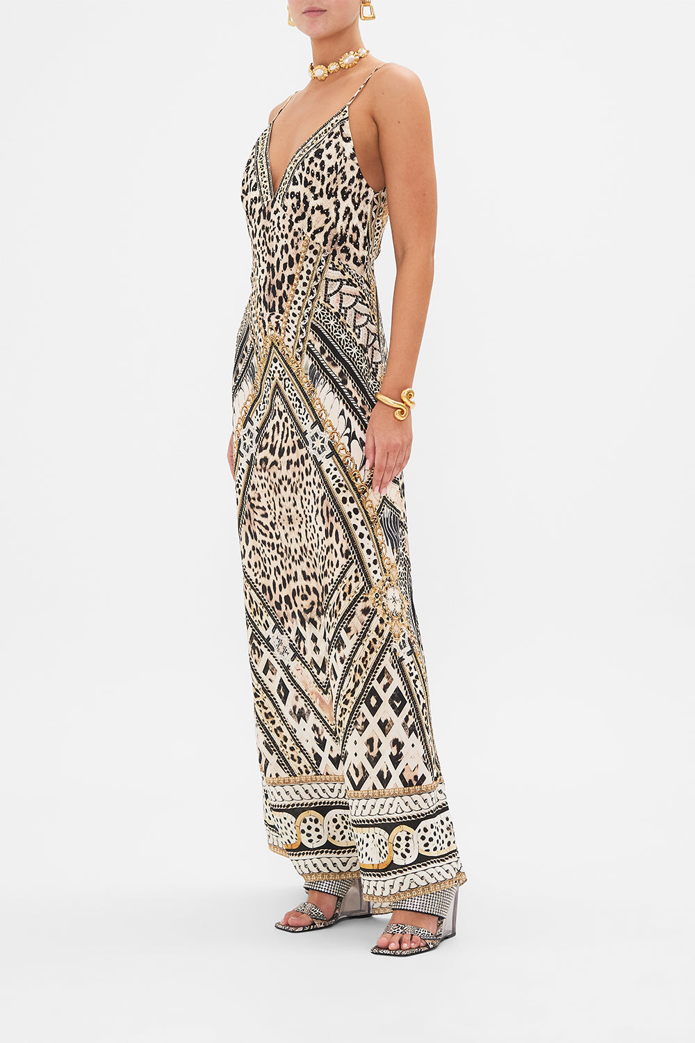 Side view of model wearing CAMILLA silk bias slip dress in Mosaic Muse print