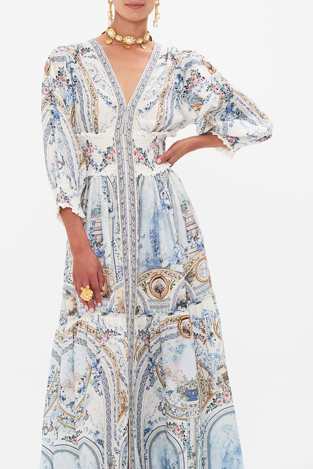 Crop view of model wearing CAMILLA silk maxi dress in Season Of The Siren print