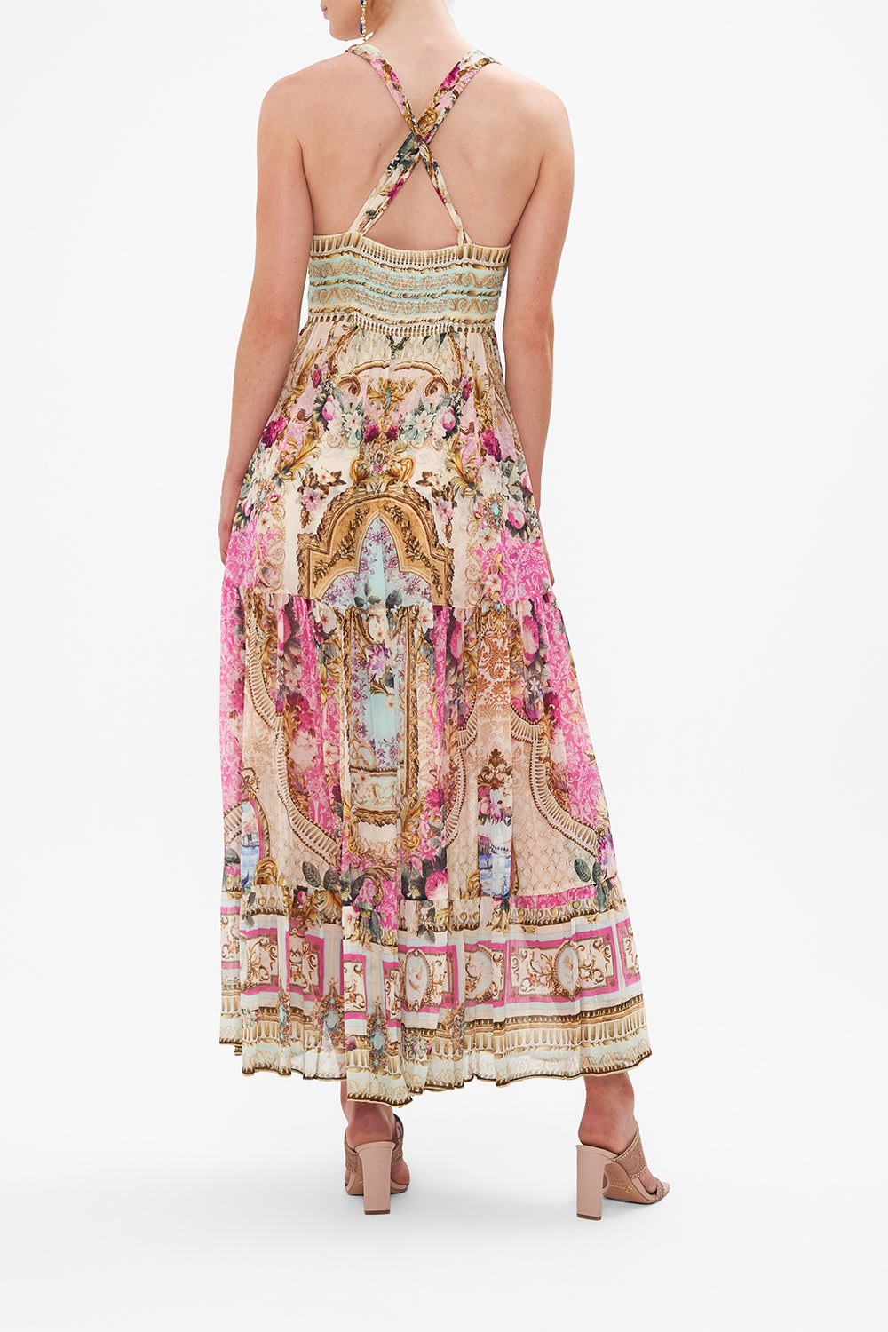 Back view of model wearing CAMILLA pink silk dress in Call of the Canal print