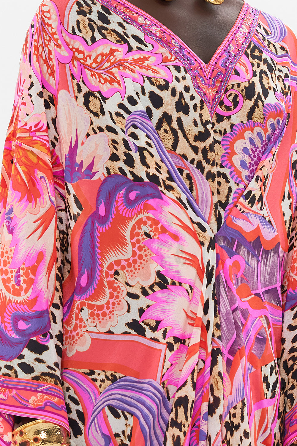 Detail view of model wearing CAMILLA designer resortwear kaftan in Viola Vintage print