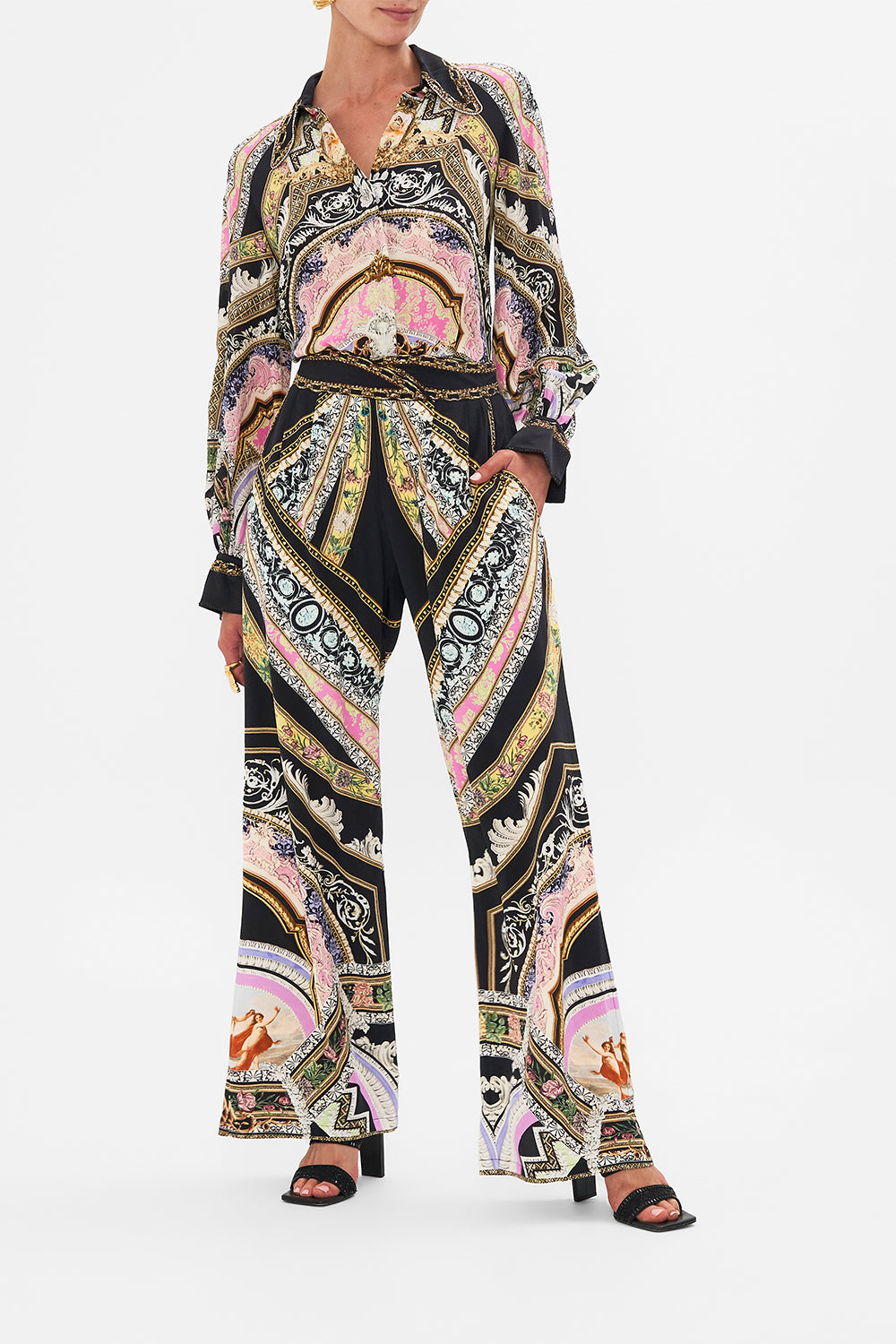 Front view of model wearing CAMILLA flared pant in Florence Field Day print