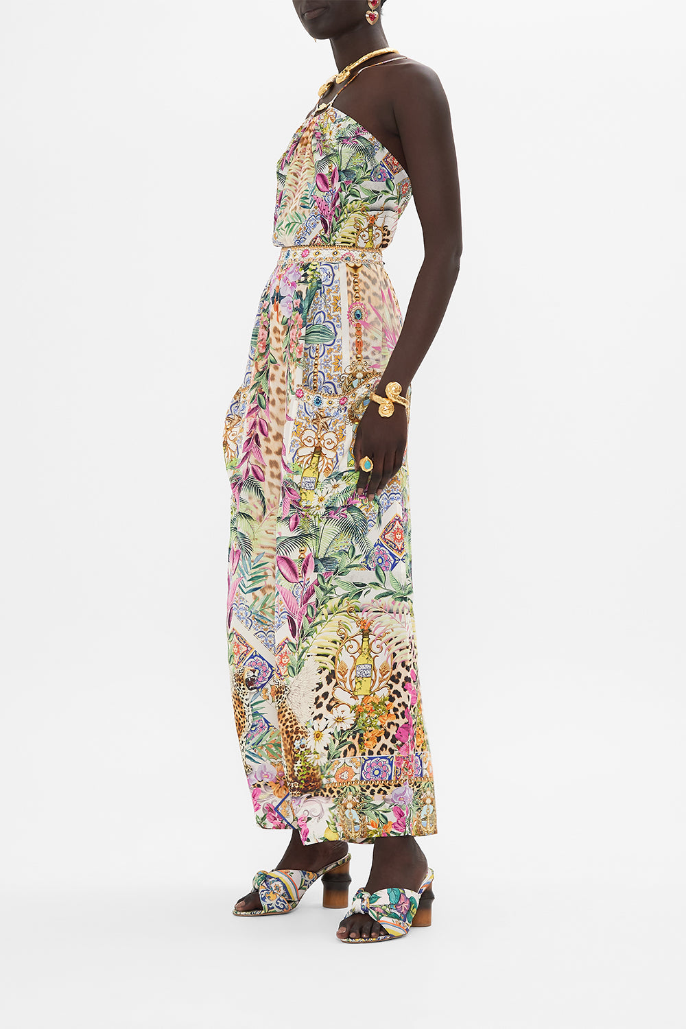 Side view of model wearing CAMILLA floral silk pants in Flowers Of Neptune print
