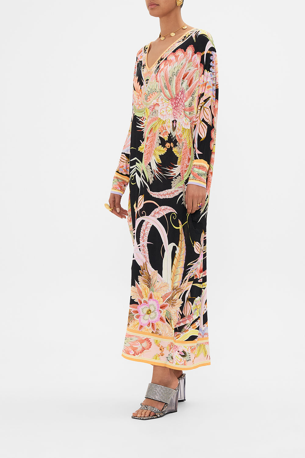 Side view of model wearing CAMILLA designer jersey kaftan in Lady of The Moon print