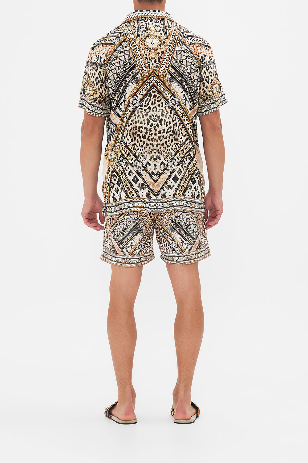 Back view of model wearing Hotel Franks By CAMILLA mens short sleeve camp collared shirt in Mosaic Muse print