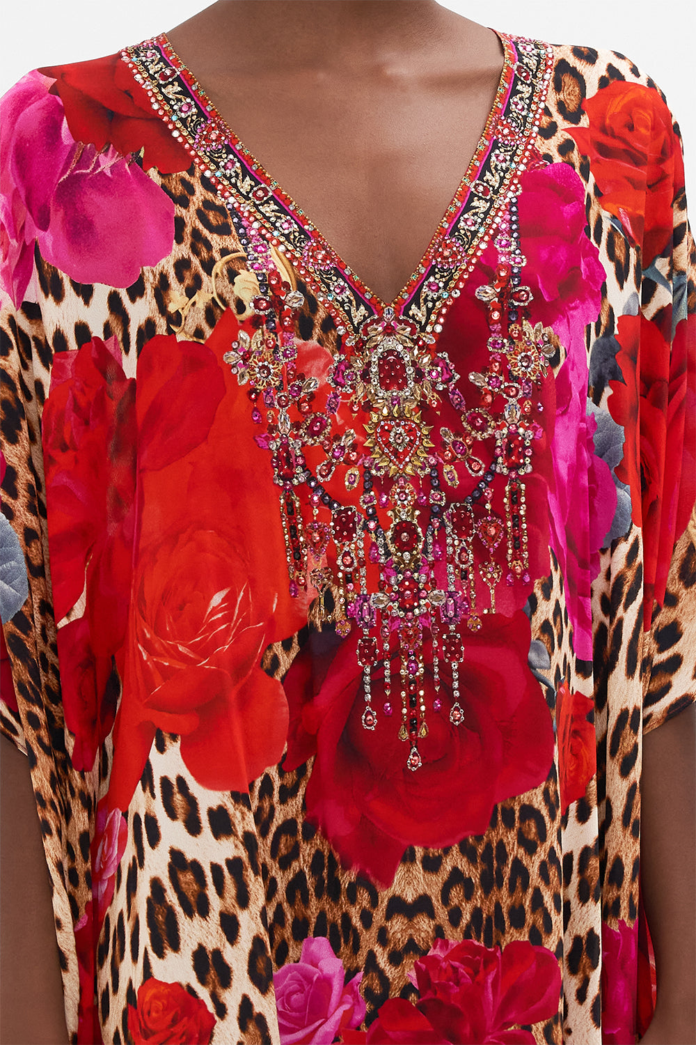 Detail view of model wearing CAMILLA floral silk kaftan in Heart Like A Wildflower print