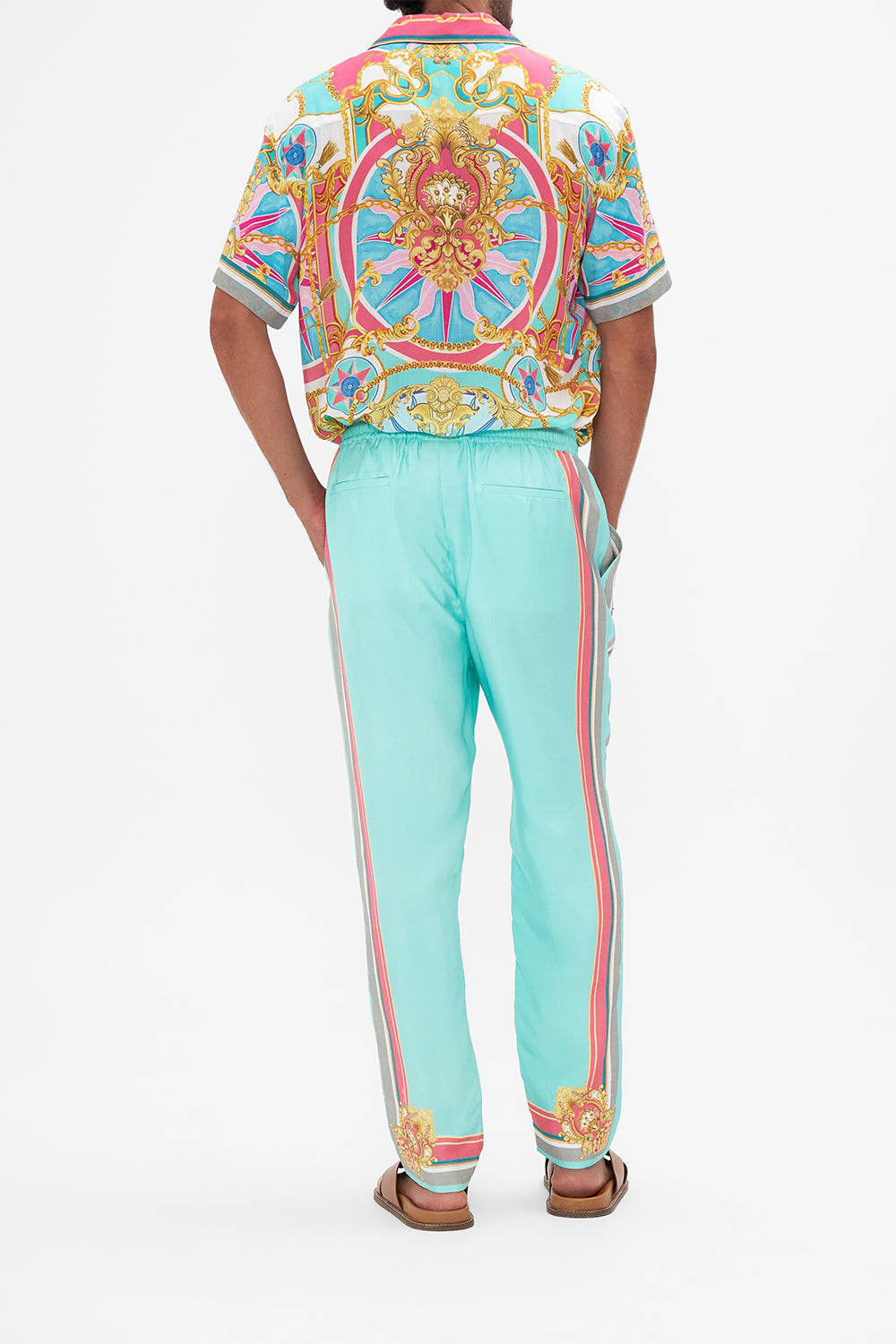 Back view of model wearing Hotel Franks by CAMILLA mens elasticated pant in Sail Away With Me print