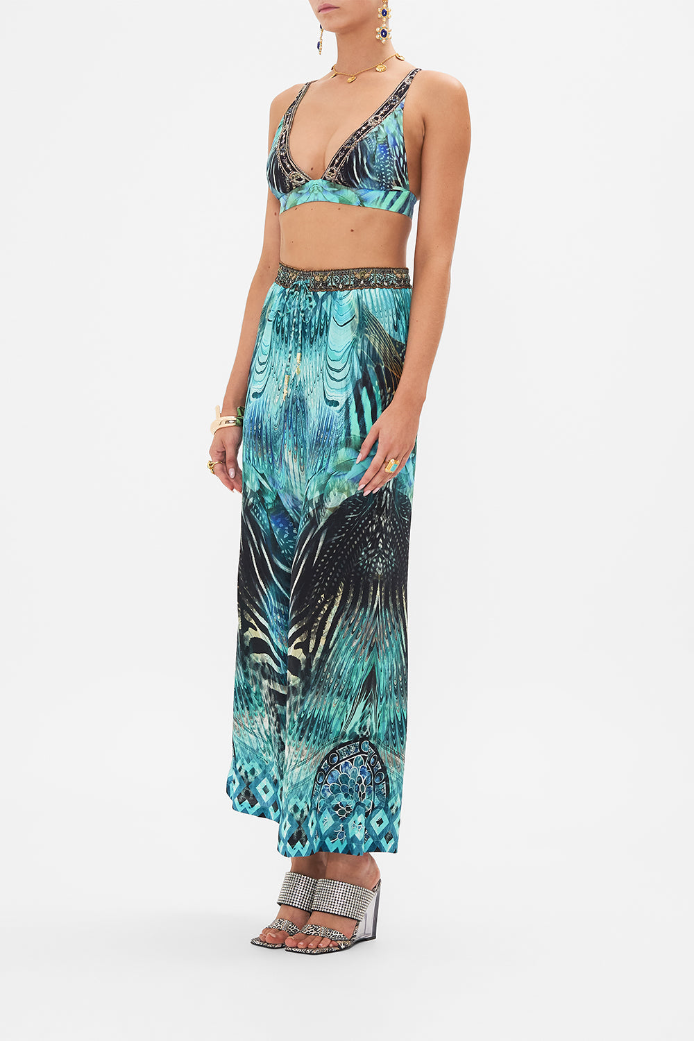 Side view of model wearing CAMILLA luxury bra in Azure Allure