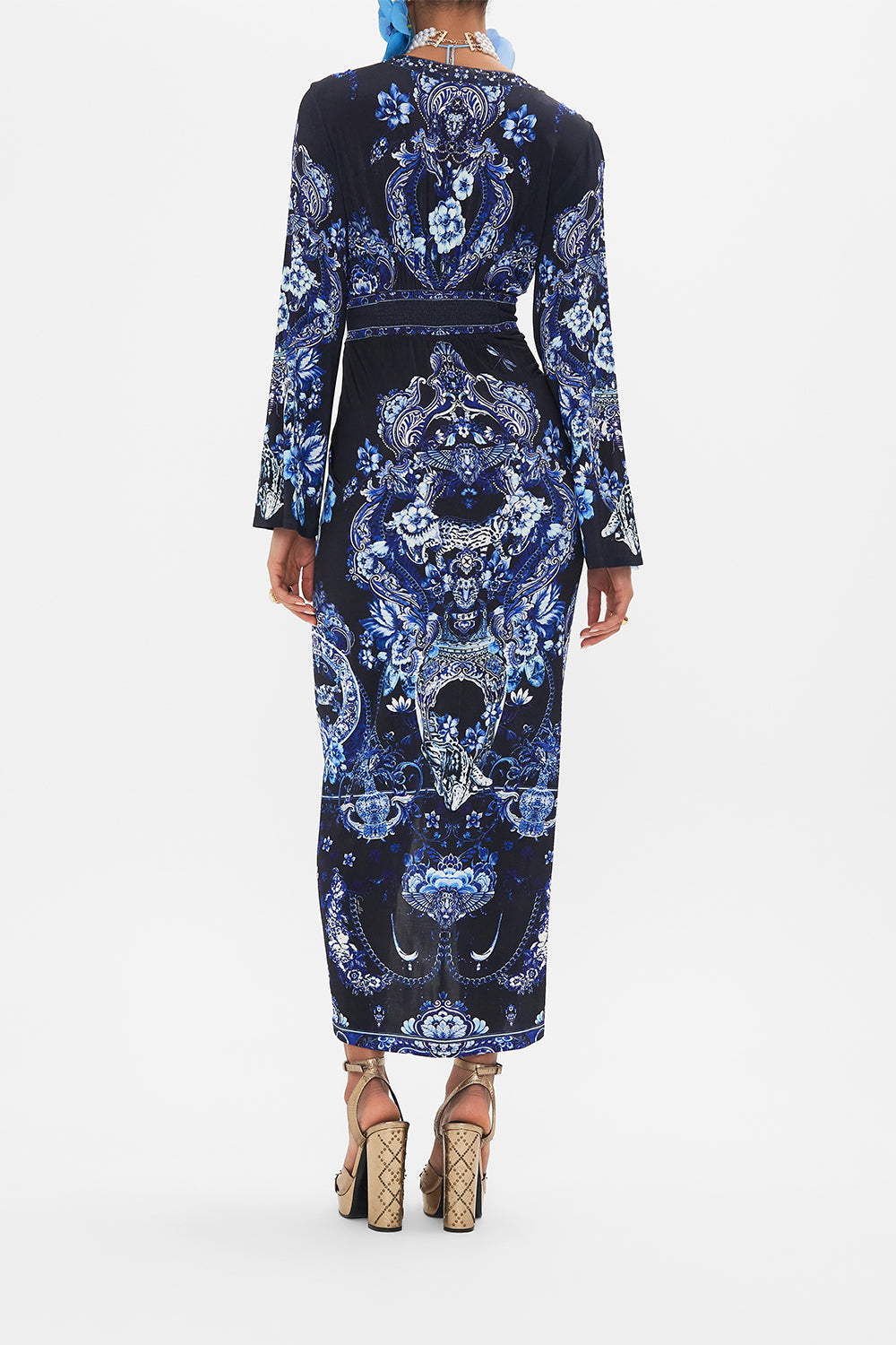 Back view of model wearing CAMILLAjersey dress in Delft Dynasty print