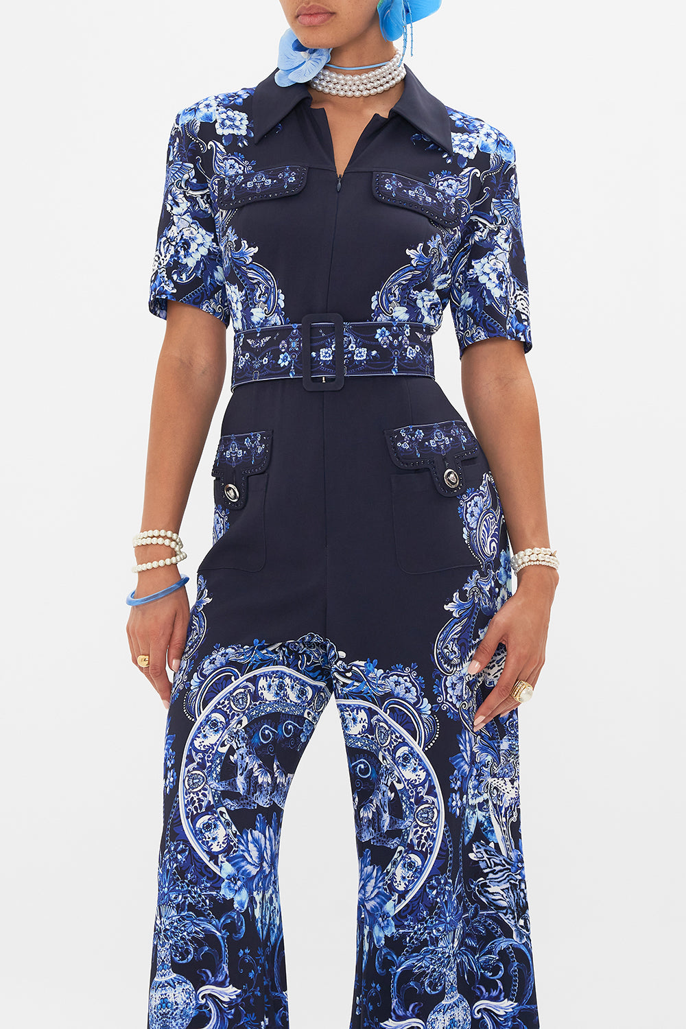 Crop view of model wearing CAMILLA jumpsuit in Delft Dynasty print