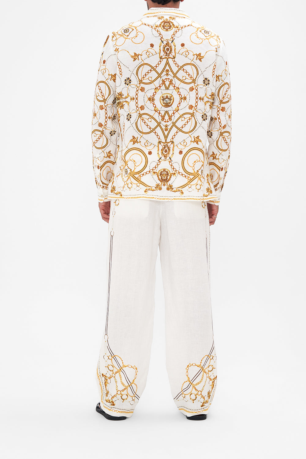 Back view of model wearing Hotel Franks By CAMILLA mens long sleeve camp collared shirt in Coast To Coast print