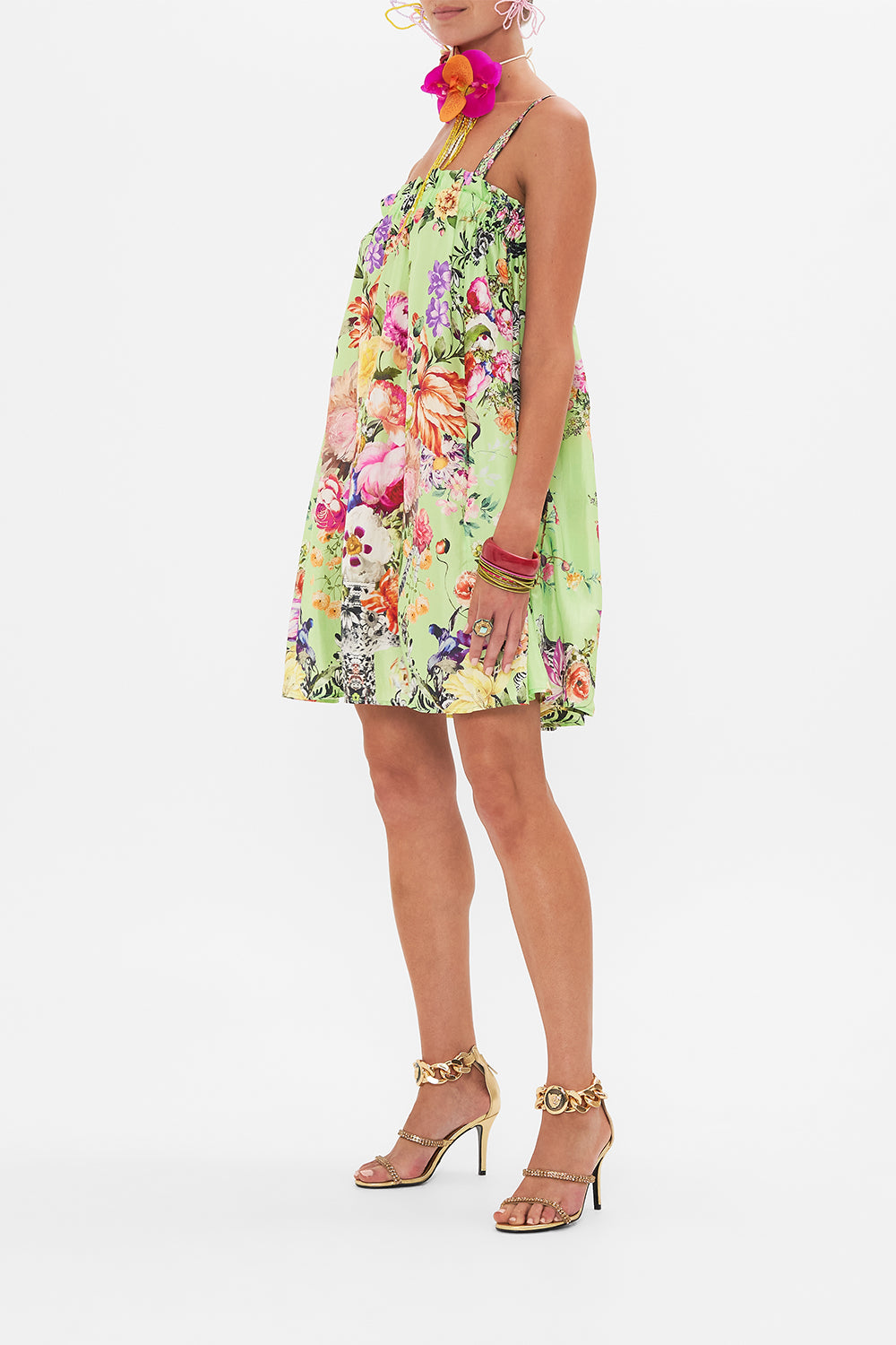 Side view of model wearing CAMILLA mini sundress in Porcelain Dream print