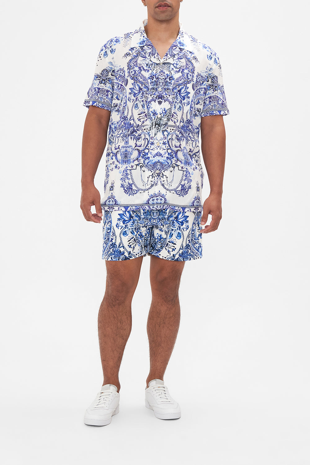 Front view of model wearing Hotel Franks By CAMILLA mens blue and white shirt in Glaze and Graze print