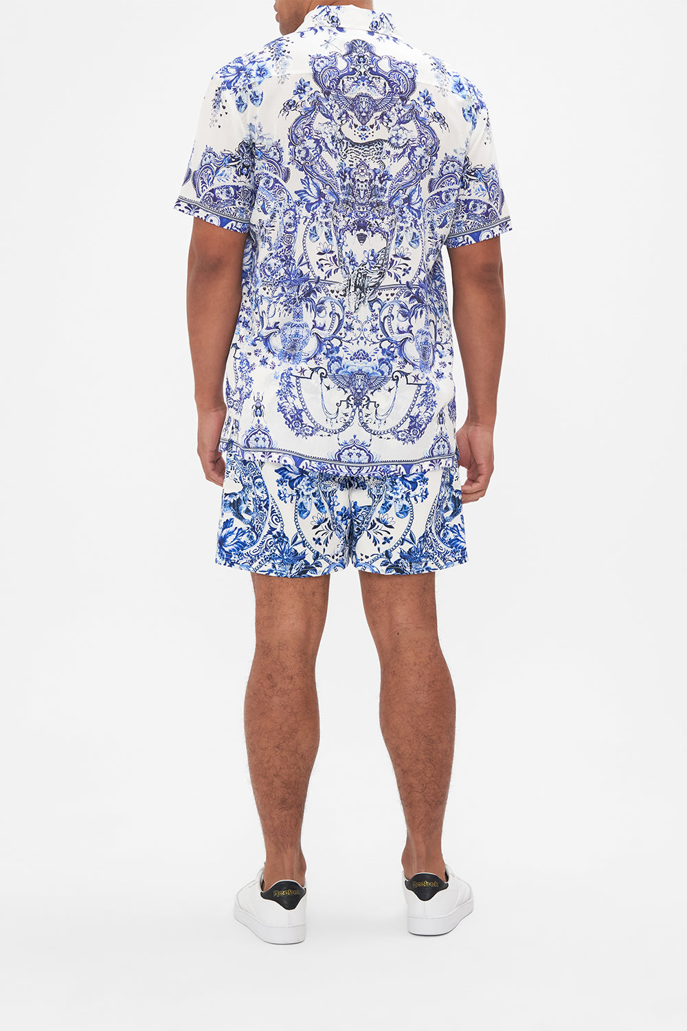 Back view of model wearing Hotel Franks By CAMILLA mens blue and white shirt in Glaze and Graze print