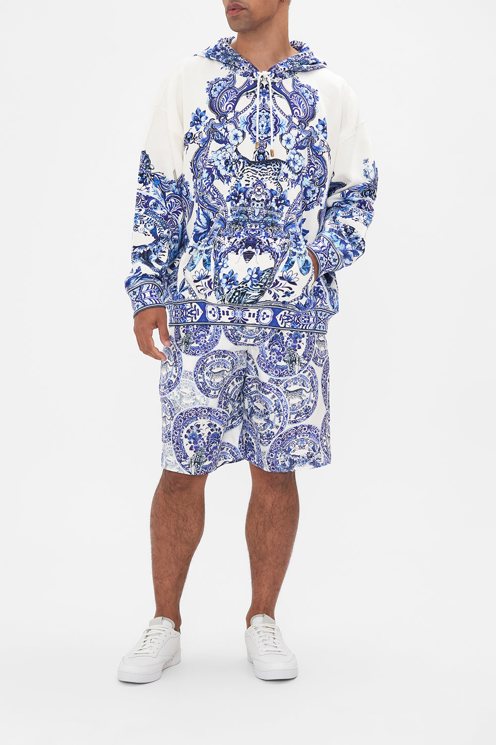 Front view of model wearing Hotel Franks by CAMILLA mens oversized hoodie in Glaze and Graze print