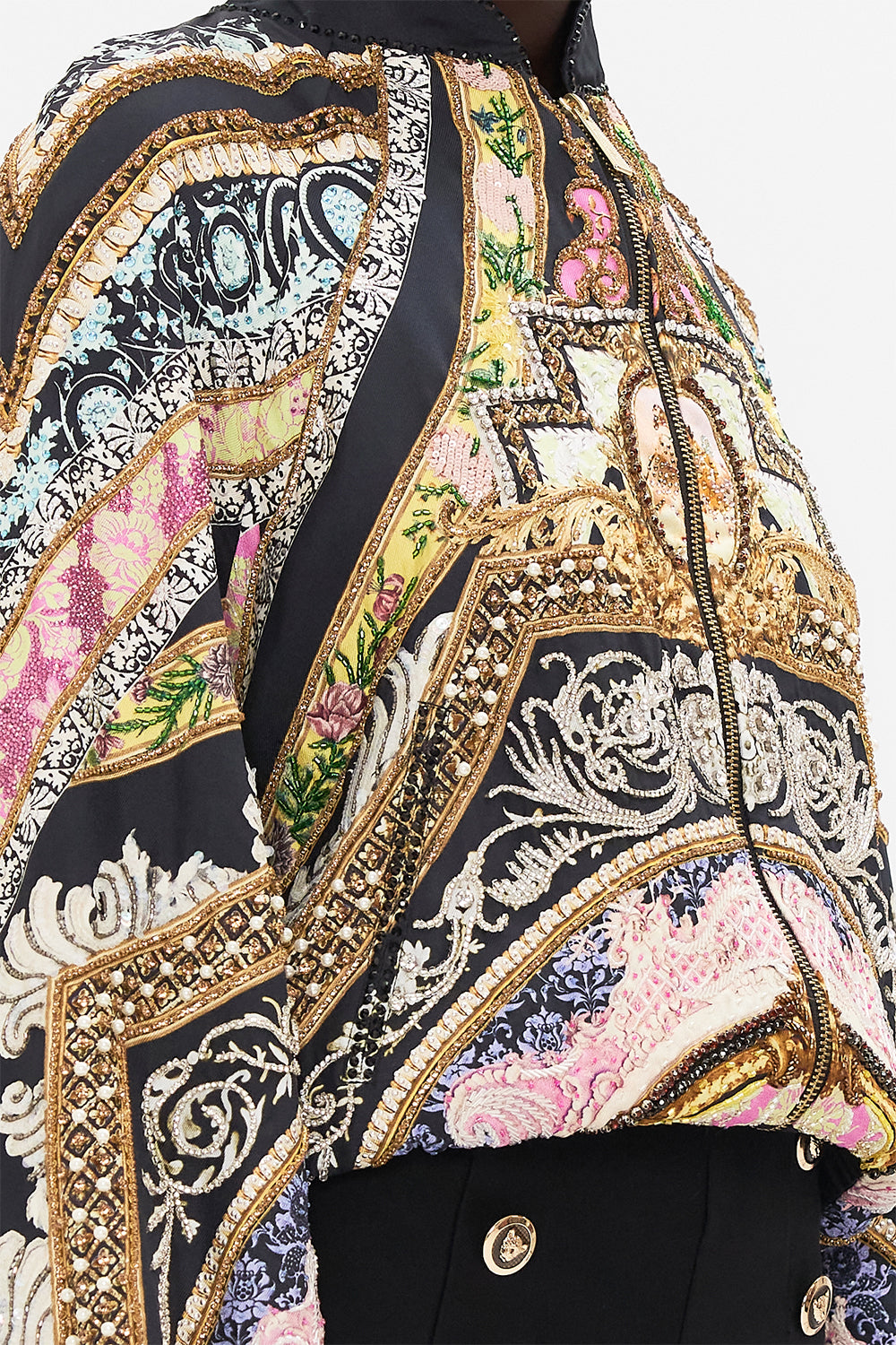 Detail view of model wearing CAMILLA silk bomber jacket in Florence Field Day Print