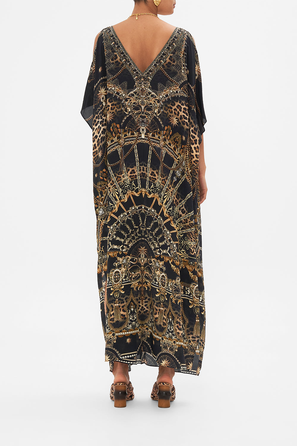 Back view of model wearing CAMILLA silk kaftan with hardware in Masked at Moonlight print
