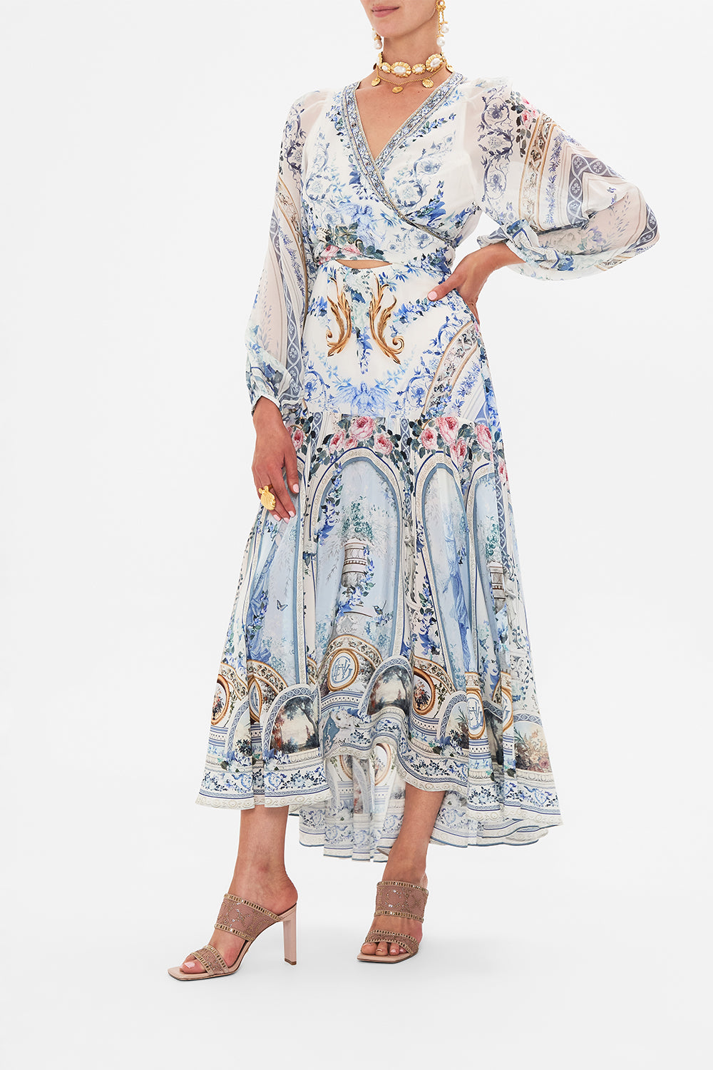 Crop view of model wearing CAMILLA wrap dress in Seasson Of The Siren print