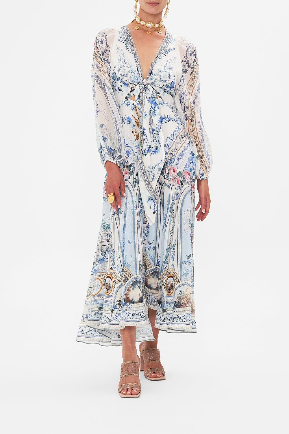 Side view of model wearing CAMILLA wrap dress in Seasson Of The Siren print