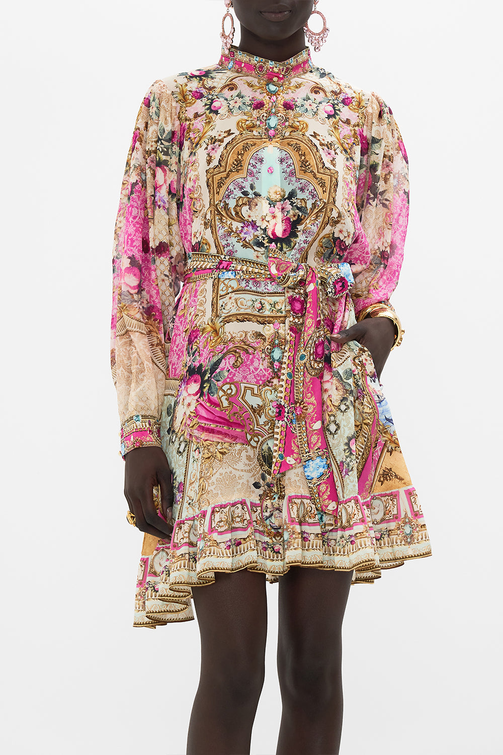 Crop view of model wearing CAMILLA pink shirt dress in Call Of The Canal print