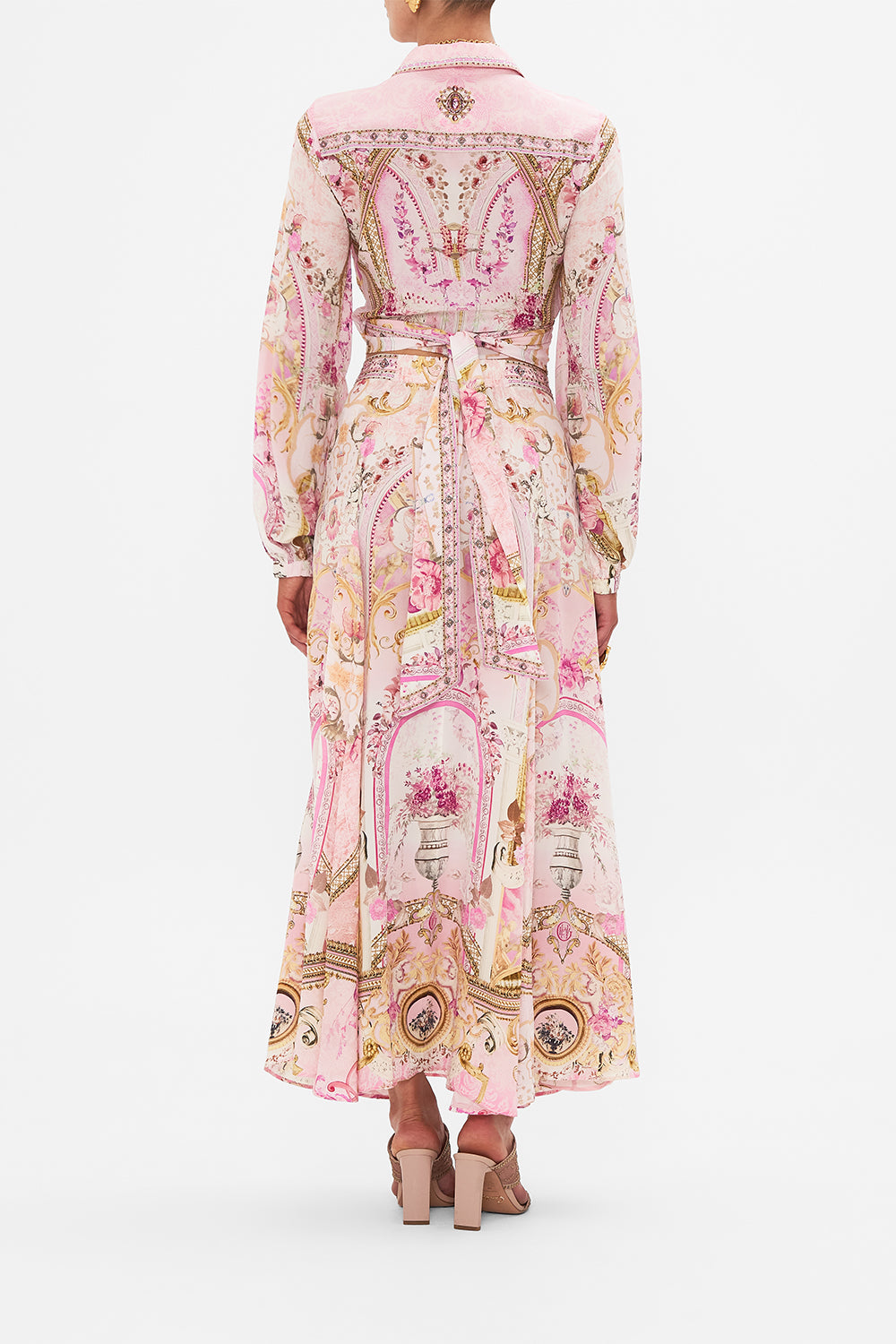 Back view of model wearing CAMILLA pink maxi skirt in Fresco Fairytale print