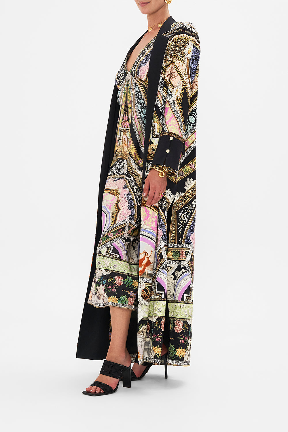 Side view of model wearing CAMILLA silk coat in Florence Field Day print