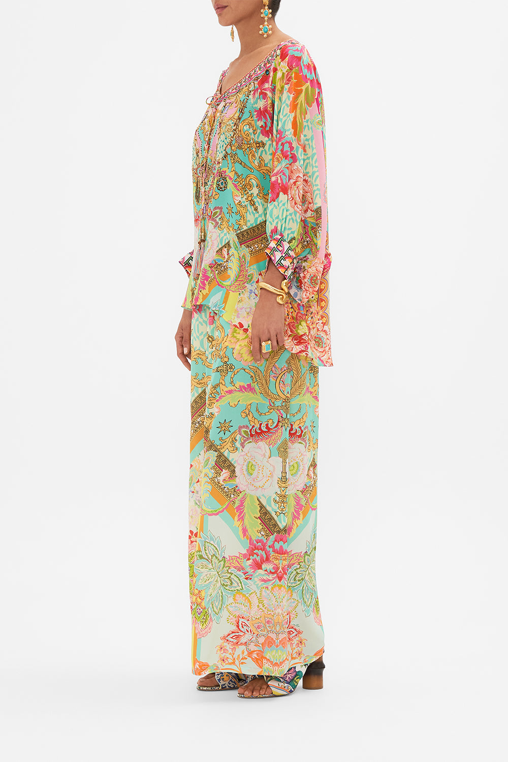 Side view of model wearing CAMILLA printed silk blouse in An Italian Welcome print