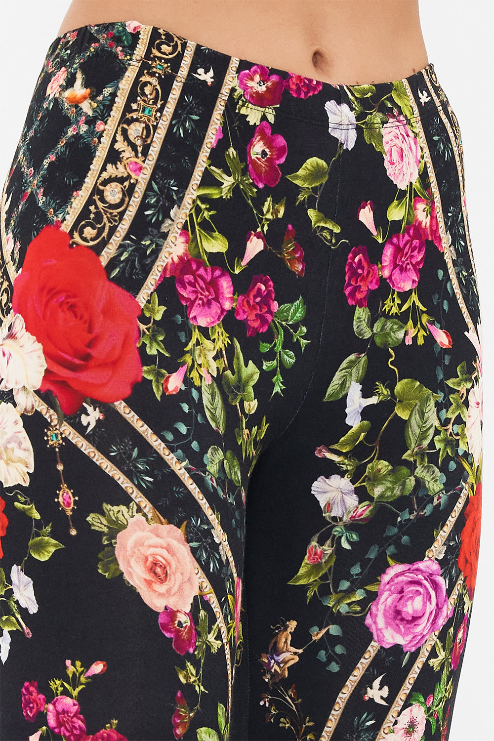 Detail view of model wearing CAMILLA womens leggings in Reservation For Love print