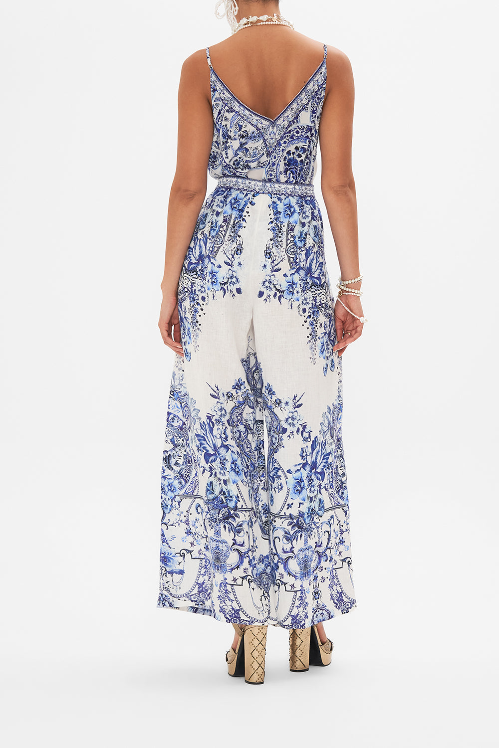 Back view of model wearing CAMILLA silk trouser in Glaze and Graze print