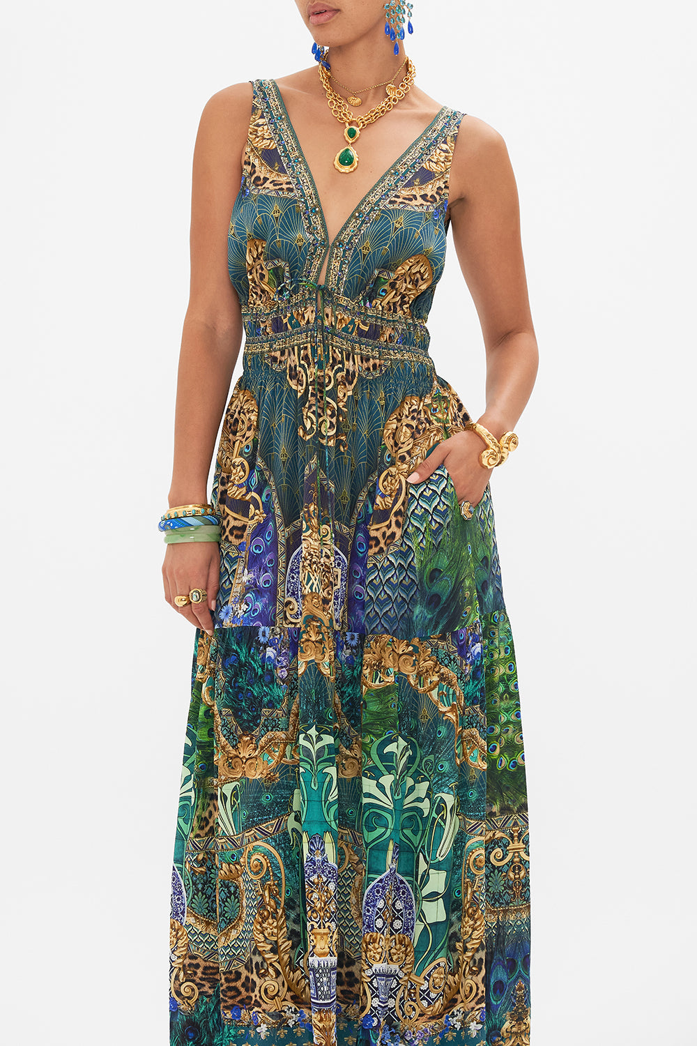 Crop view of model wearing CAMILLA silk maxi dress in Peacock Rock print