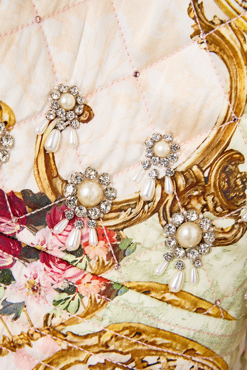 LAYER WITH TIE BELT AND FEATHERS THE QUEENS QUARTERS