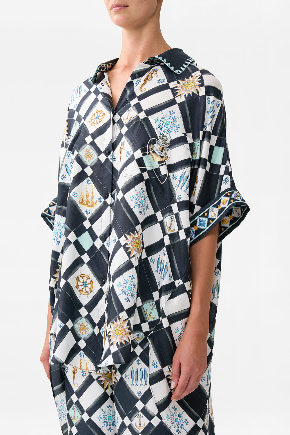 The CAMILLA Oversized Pocket Tunic in our Folk Afloat print.