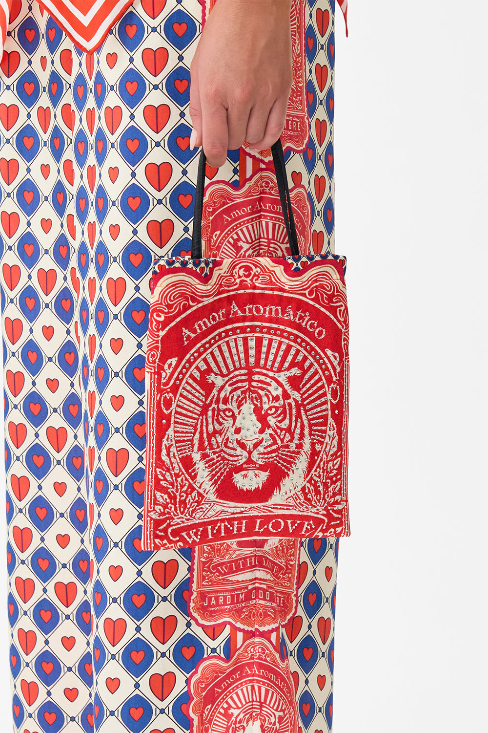 The CAMILLA Embellished Mini Tote With Chain Strap in our Rinse & Roar print.