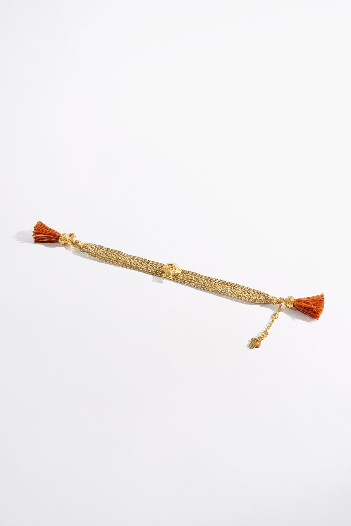 ENCHANTED OCEANIA WOVEN TASSEL BRACELET GOLD