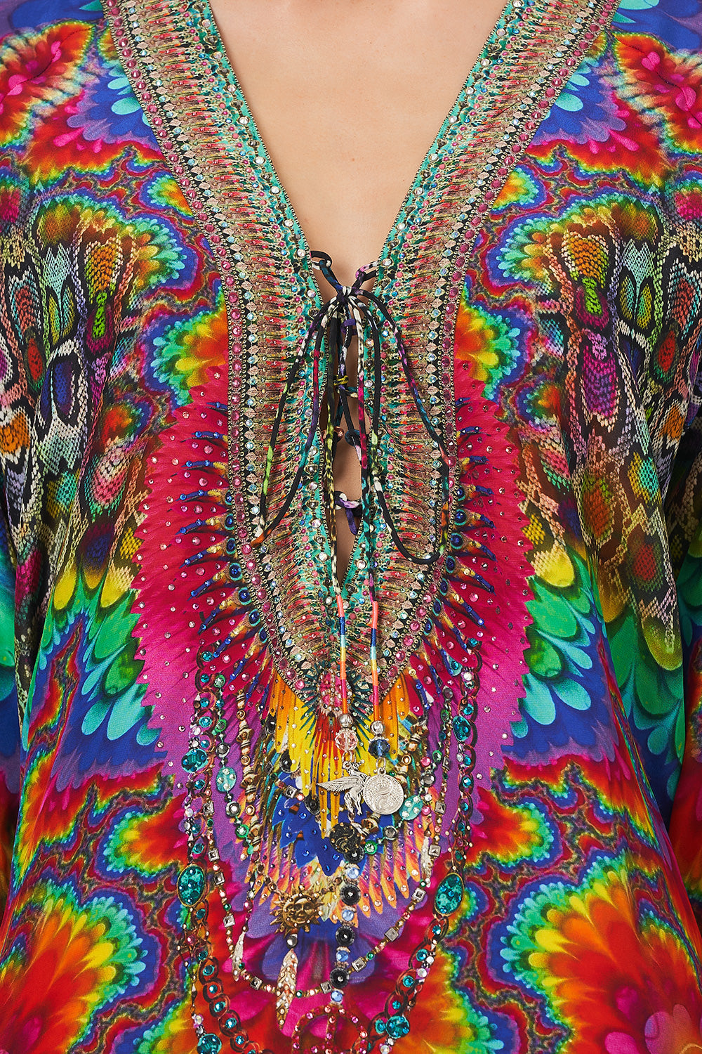 LACE UP BLOUSE COMING DOWN FROM COSMOS