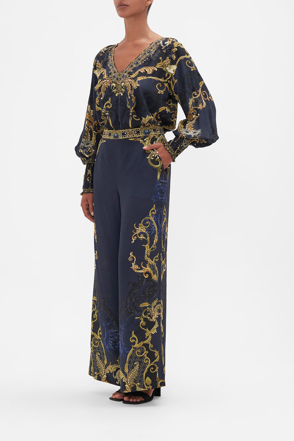 Side view model wearing of CAMILLA silk pants in Moonlight Melodies print