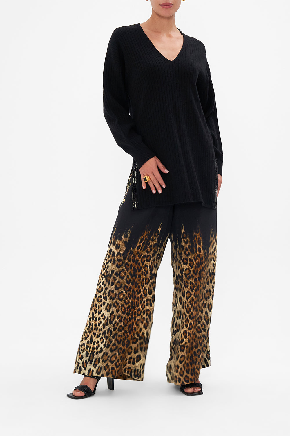 Front view of model wearing CAMILLA black v neck wool cashmere knit jumper in Lions Mane print