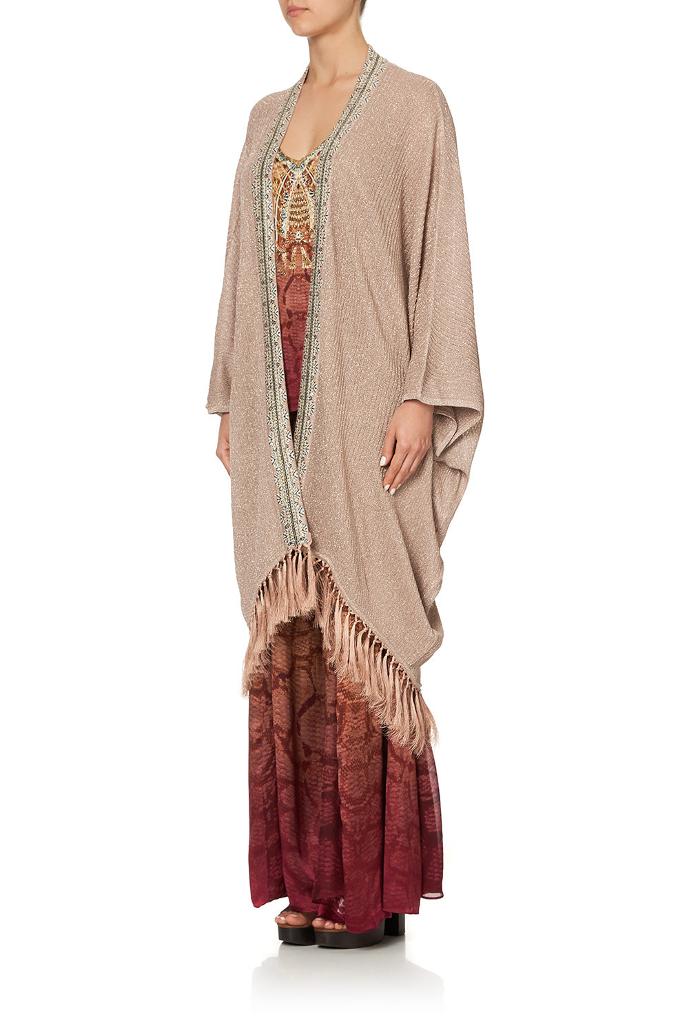 METALLIC KNIT PONCHO WITH TASSELS COASTAL TREASURE