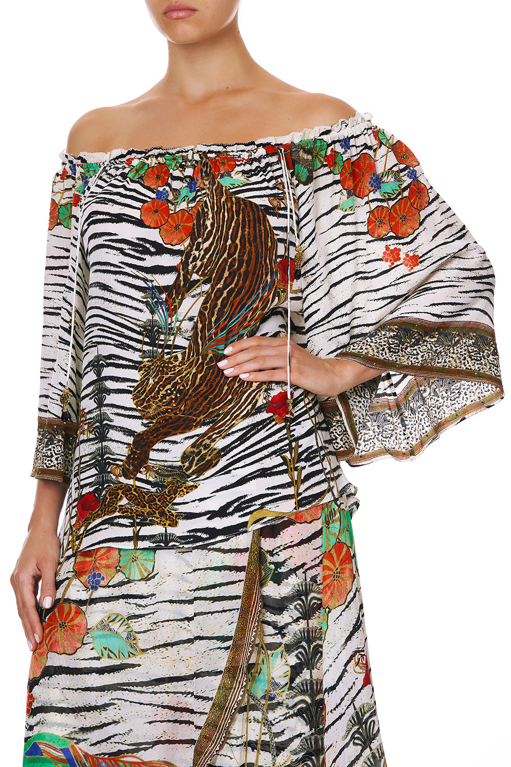 OFF SHOULDER FLARE BLOUSE COSMIC CONFLICT