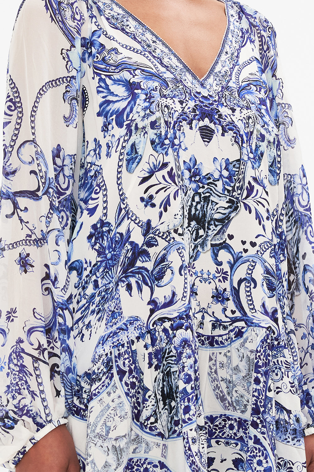 Detail view of model wearing CAMILLA silk dress in Glaze and Graze print