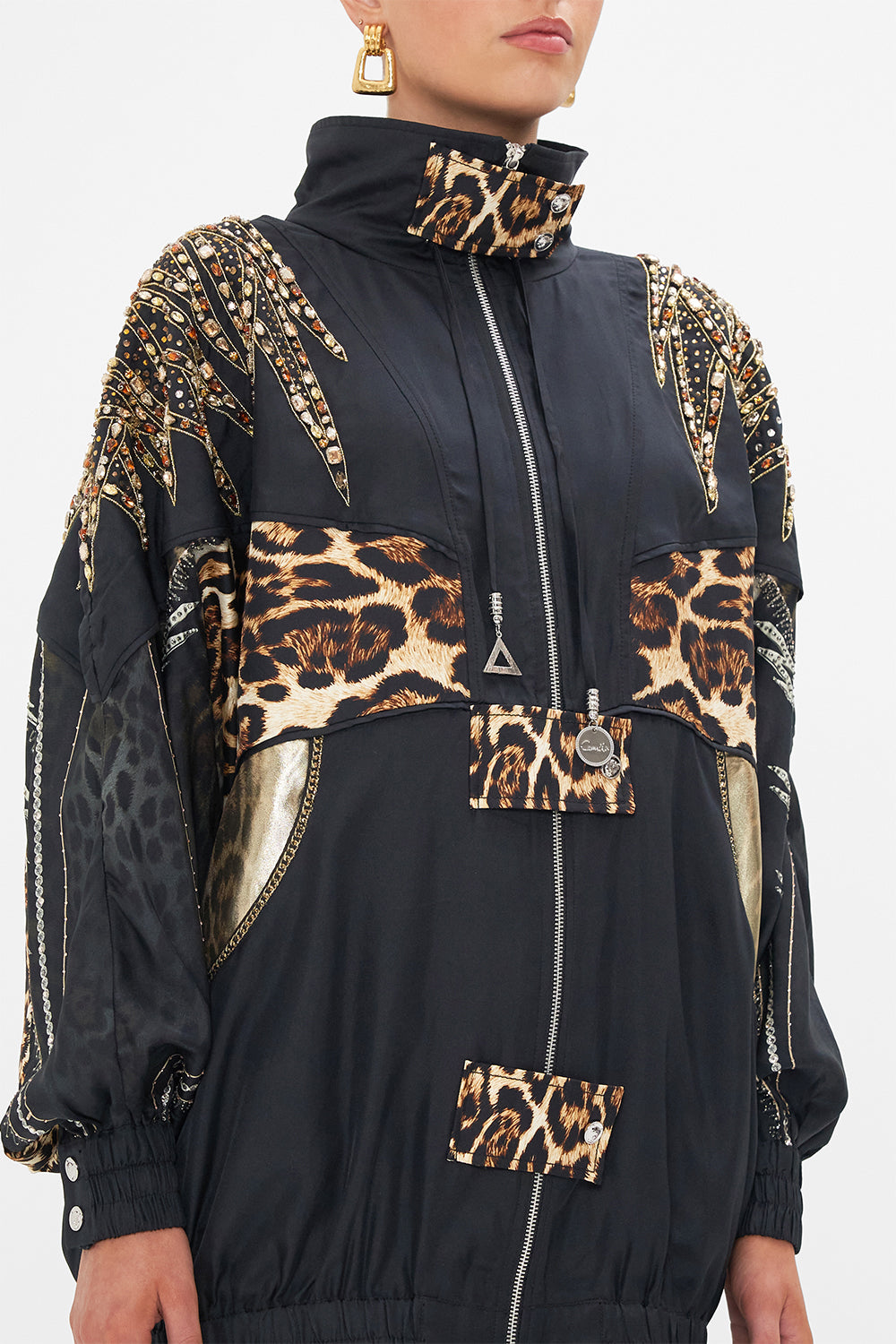 Detail view of model wearing CAMILLA animal print jacket in Chaos In The Cosmos print