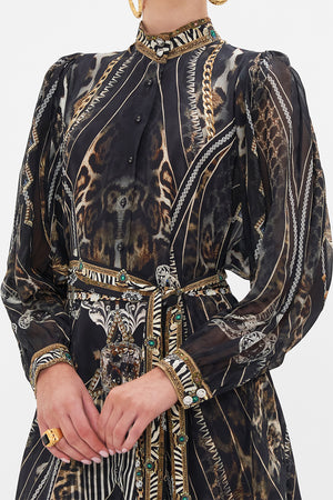 Detail view of model wearing CAMILLA silk shirt dress Chaos In The Cosmos animal print