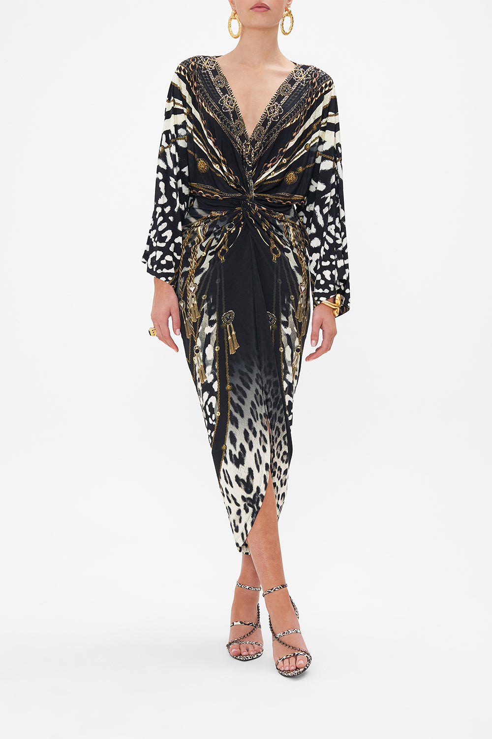 Front view of model wearing CAMILLA black and white animal print dress in Untamed Royalty print
