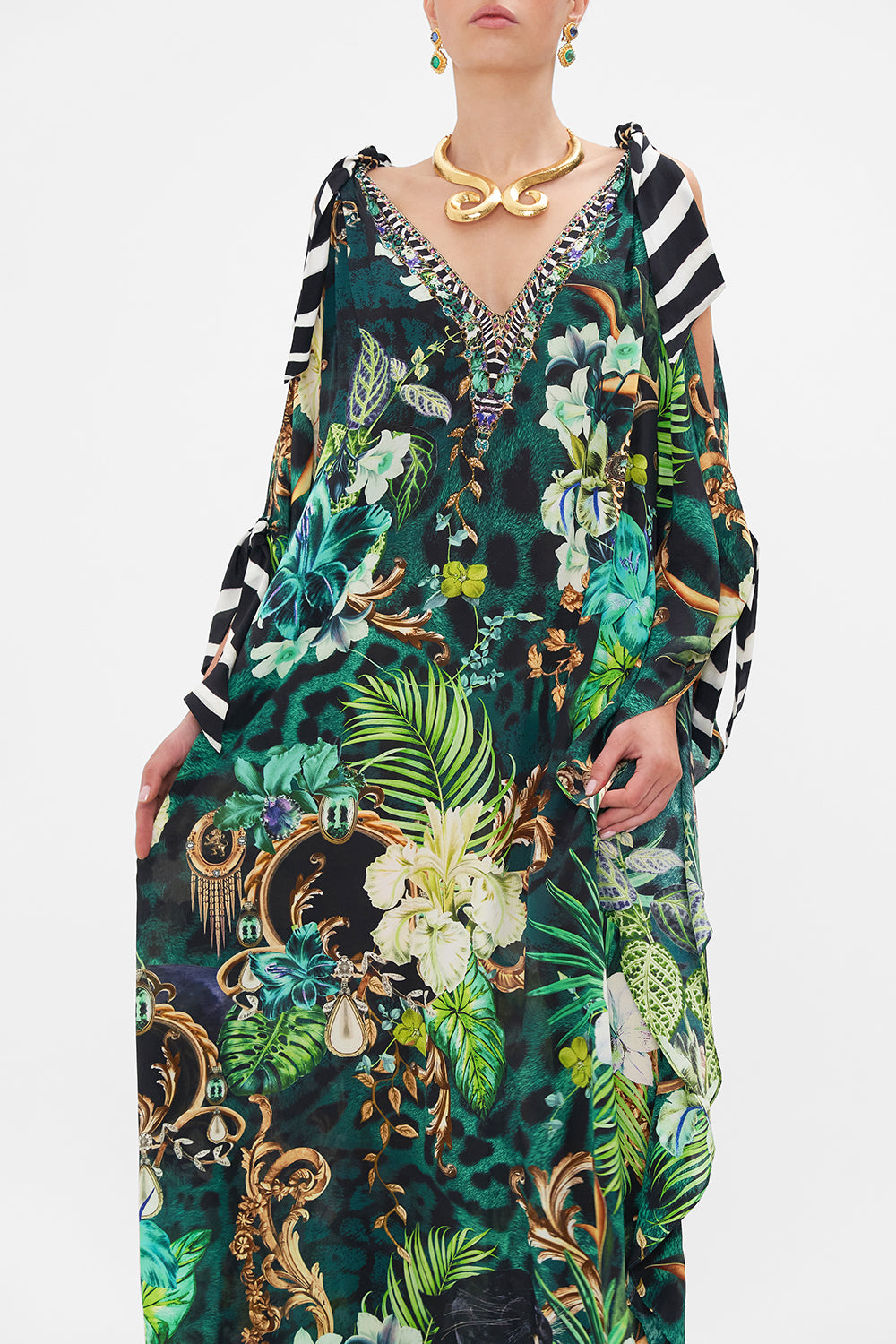 Crop view of model wearing CAMILLA silk kaftan in Sing My Song print